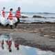 FILE - In this Sunday, Oct. 25, 2015, file, photo, Red Crescent workers carry the lifeless body of a migrant, in the port city of Khoms, Libya. The work of photographer and video journalist Mohamed Ben Khalifa, who was killed in Libya on Saturday, Jan. 19, 2019, reflected Libya's post-2011 chaos of rival militias fighting for control as well as the humanitarian tragedy of waves of people fleeing North Africa, the Middle East and sub-Saharan Africa.
